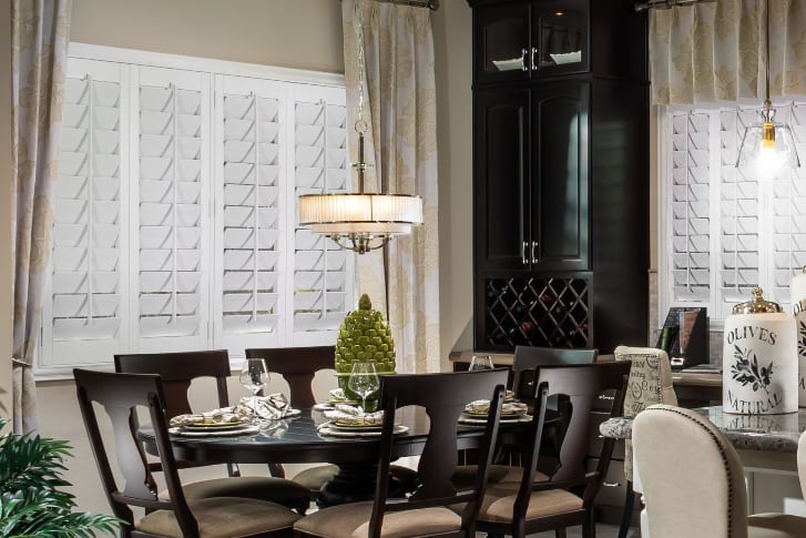 Dining room with white plantation shutters